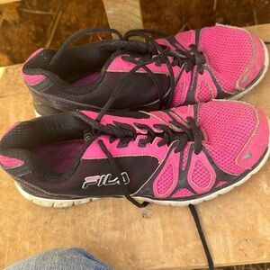Pink an black tennis shoes